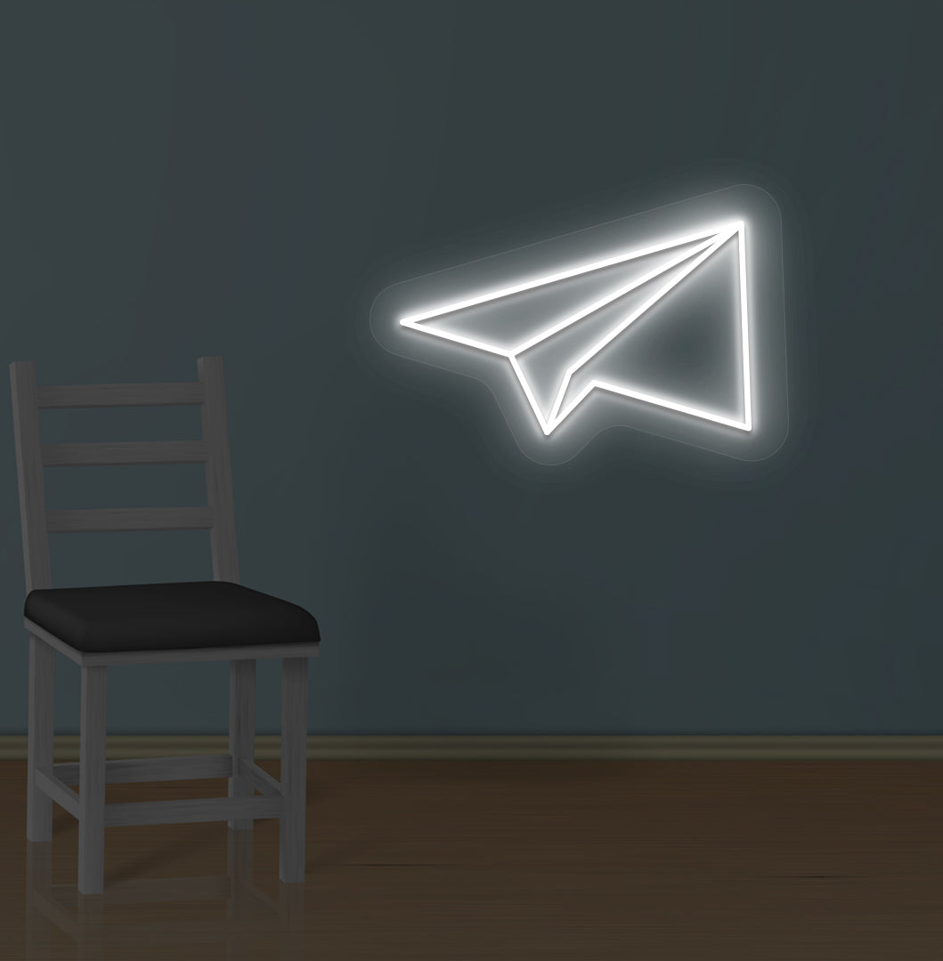 Image of a paper plane LED neon sign glowing on a wall in white color.