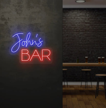 Personalized Bar Name neon sign mounted on decorative wall in blue color.