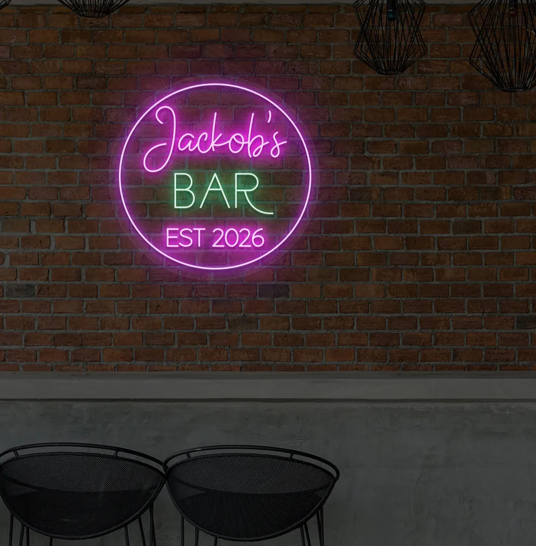 Custom Bar Name EST neon sign in pink color mounted on aesthetic wall.