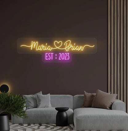 Orange personalized Couple Name EST LED neon sign for anniversary decoration.