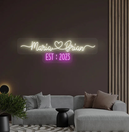 Warm white personalized Couple Name EST LED neon sign for anniversary decoration.