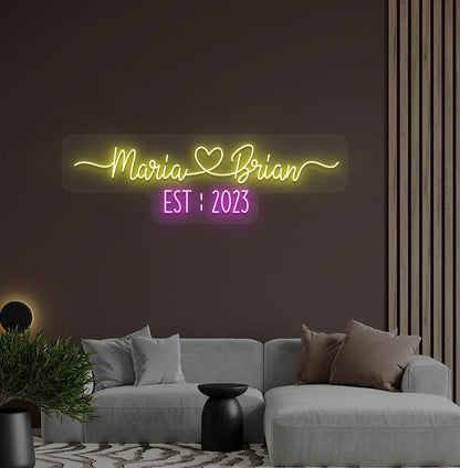 Yellow personalized Couple Name EST LED neon sign for anniversary decoration.