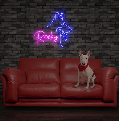 Custom Dog Name neon sign in pink color mounted on modern wall decor.