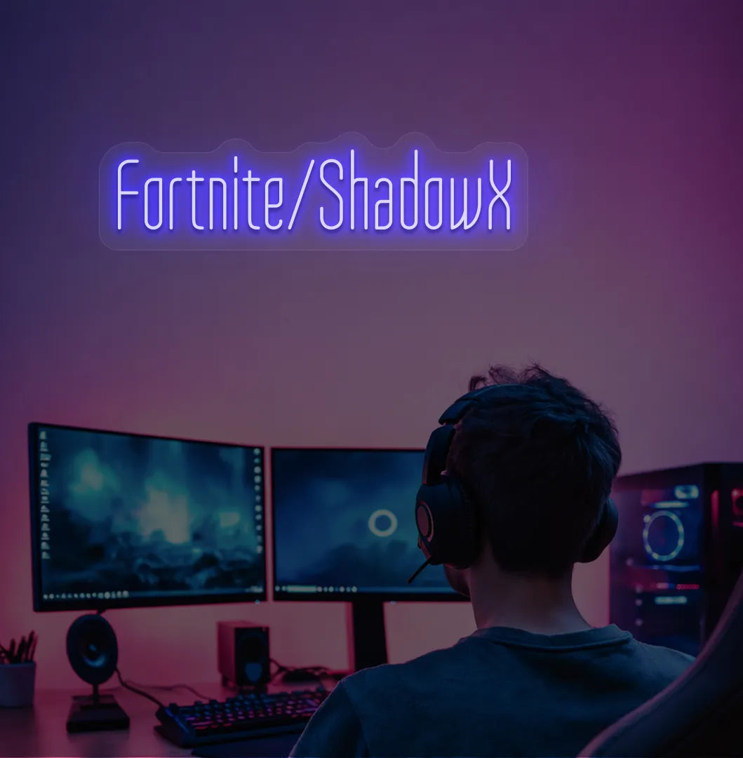 Blue LED Personalized Game and Name neon sign glowing on gaming room wall.
