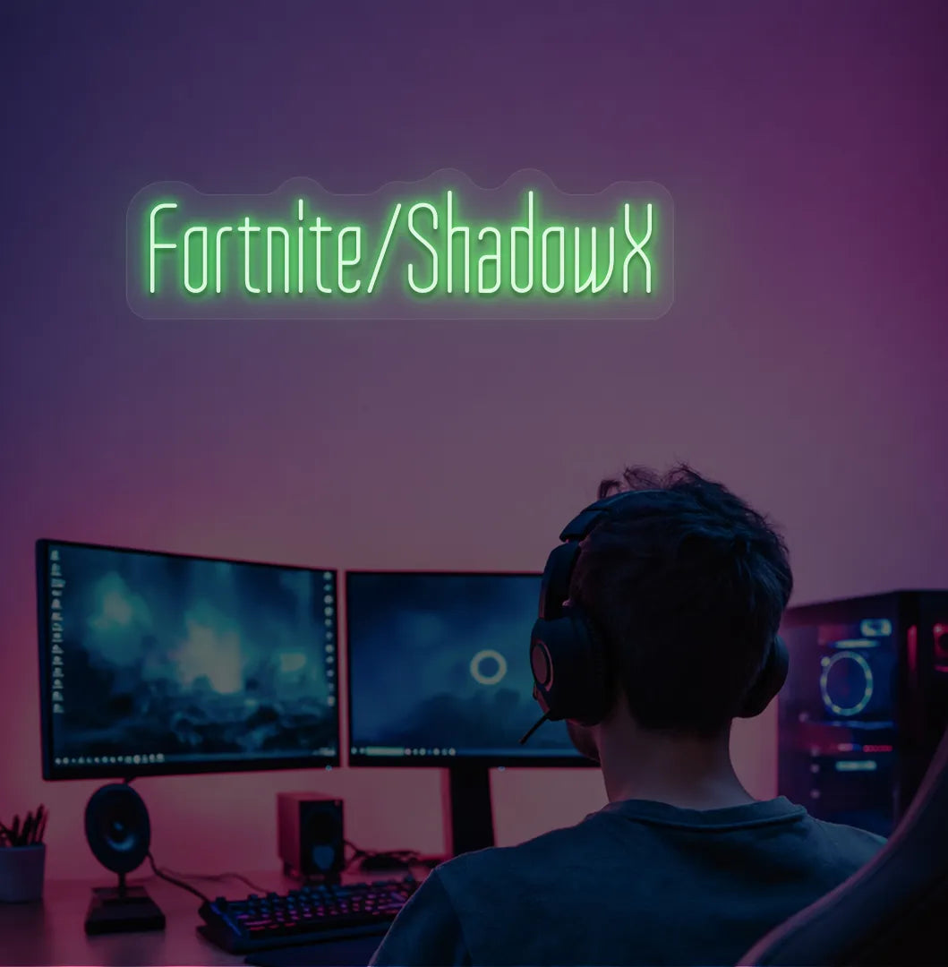 Modern gaming setup featuring Personalized Game and Name blue neon sign in green color.
