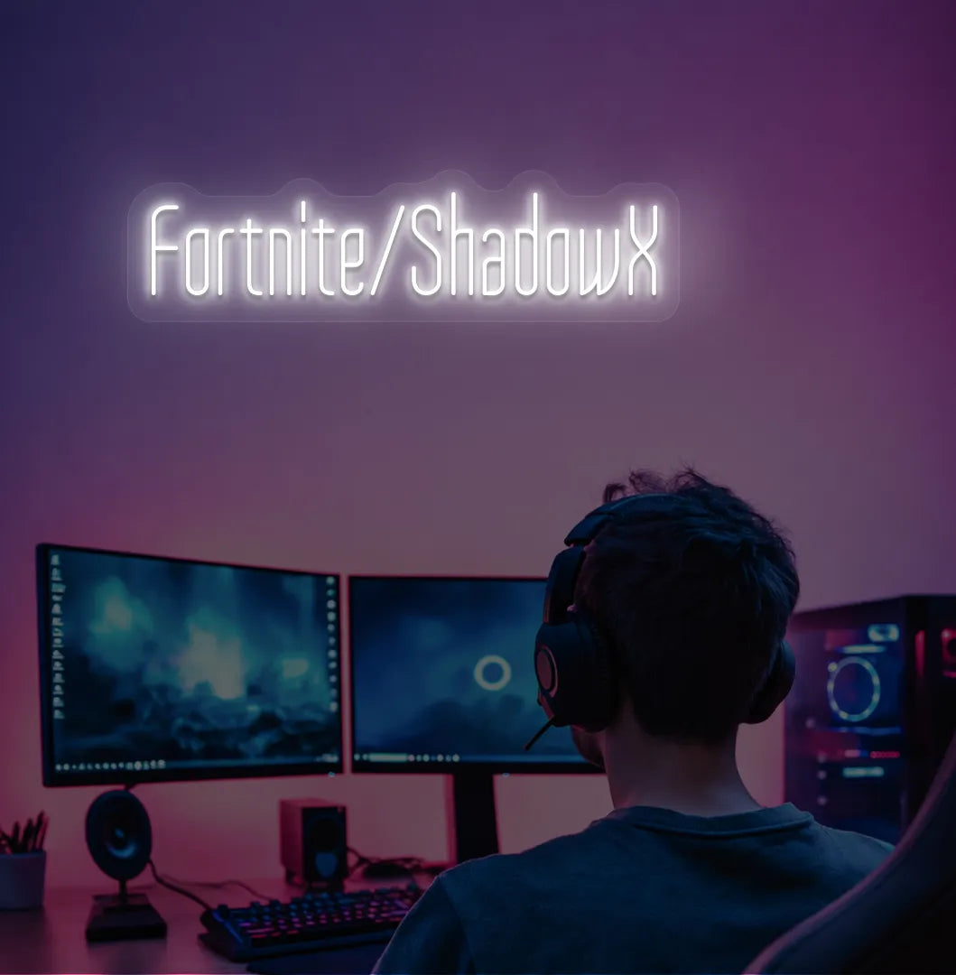 White LED Personalized Game and Name neon sign glowing on gaming room wall.