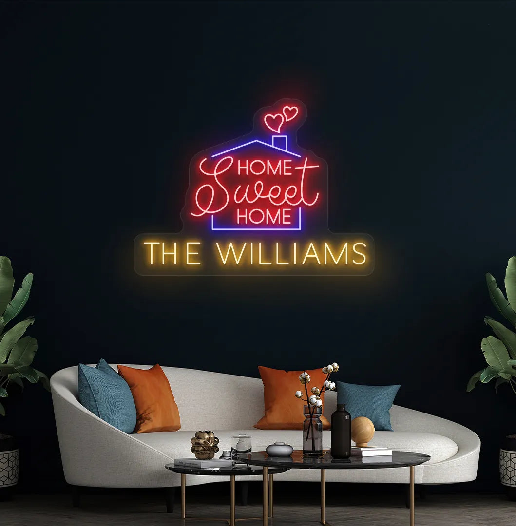 Stylish Personalized Home Sweet Home Name neon sign mounted on aesthetic wall in orange color.
