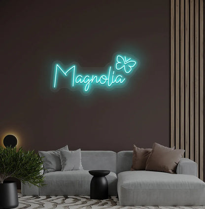Custom Name with Butterfly neon sign in ice blue color mounted on modern wall.