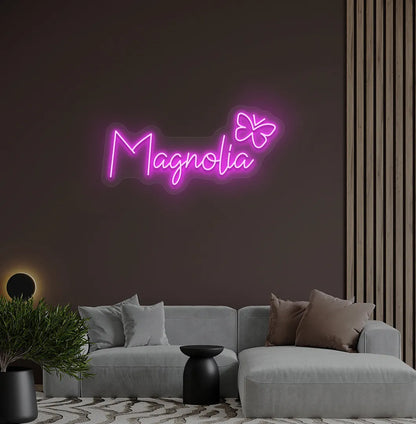 Custom Name with Butterfly neon sign in pink color mounted on modern wall.