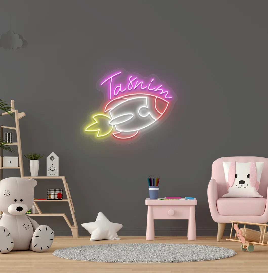Custom Space Explorer Name neon sign in pink color mounted on modern wall decor.