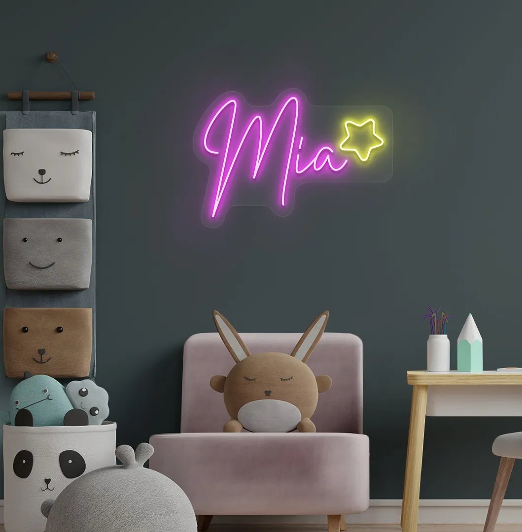 Personalized Star with Name pink LED neon sign mounted on kids' room wall.