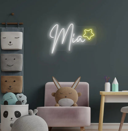 Personalized Star with Name white LED neon sign mounted on kids' room wall.