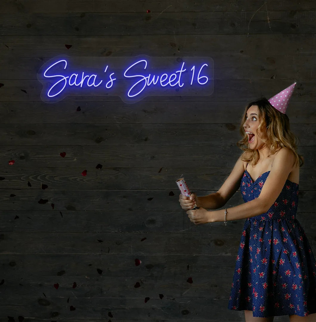 Bright blue Personalized Sweet 16 neon sign mounted on decorative wall.