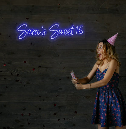 Bright blue Personalized Sweet 16 neon sign mounted on decorative wall.