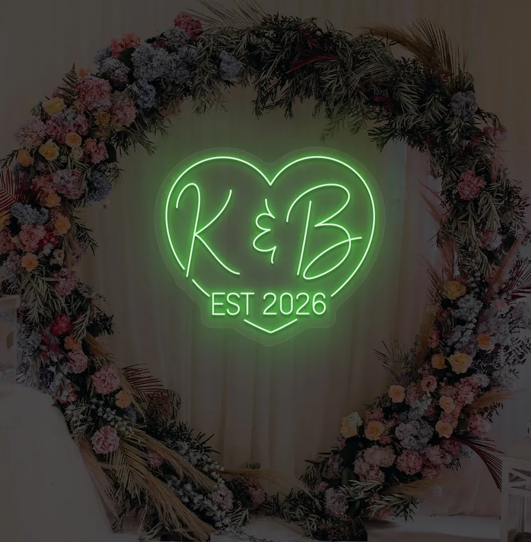 Image of a custom wedding EST neon sign in green color on aesthetic wall decor.