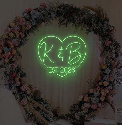 Image of a custom wedding EST neon sign in green color on aesthetic wall decor.