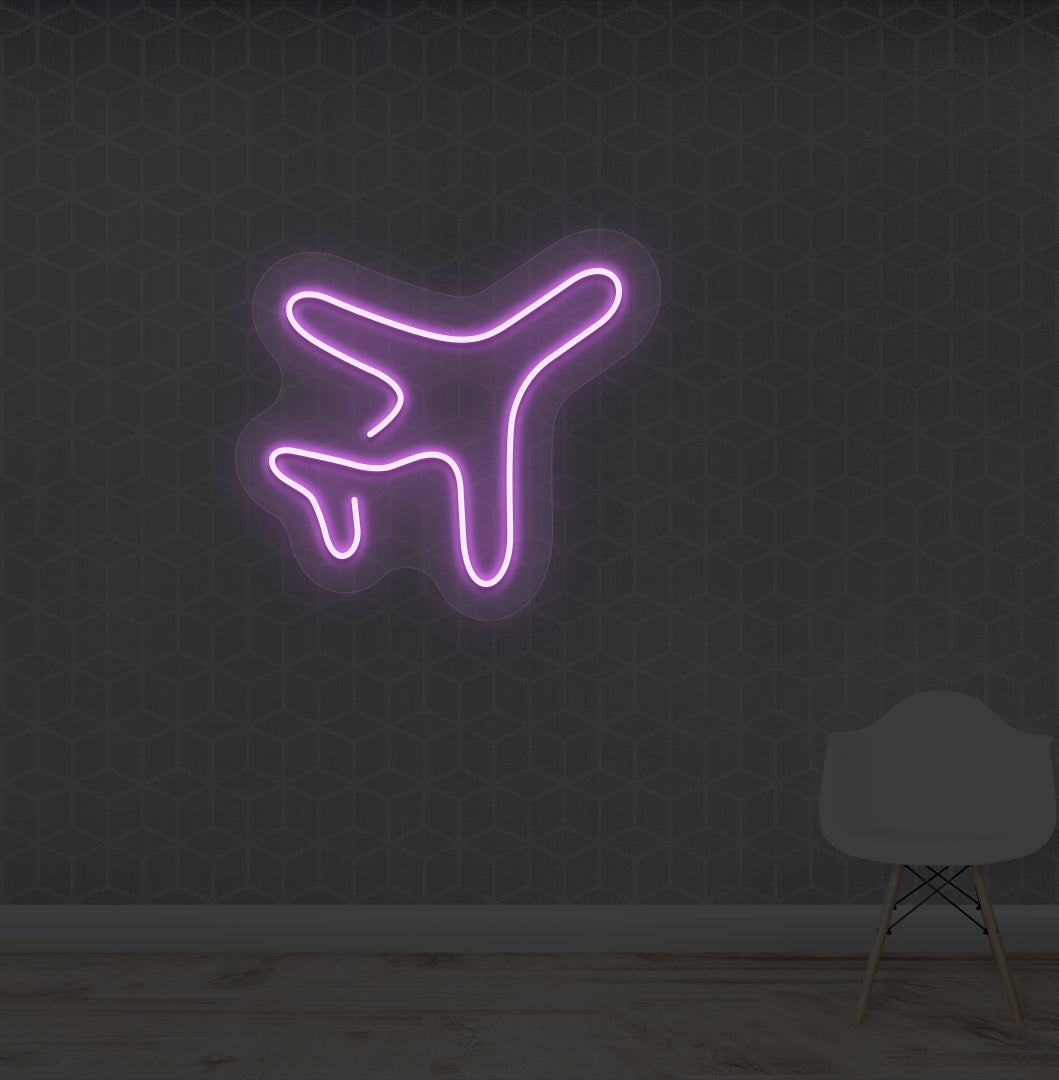 Travel themed wall with plane LED neon sign glowing purple.