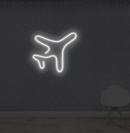 Image of a stylish "plane" LED neon Sign mounted on a wall in white color.