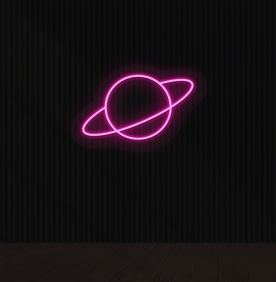 A space-themed planet LED neon sign glowing pink on the wall.