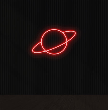 A space-themed planet LED neon sign glowing red on the wall.