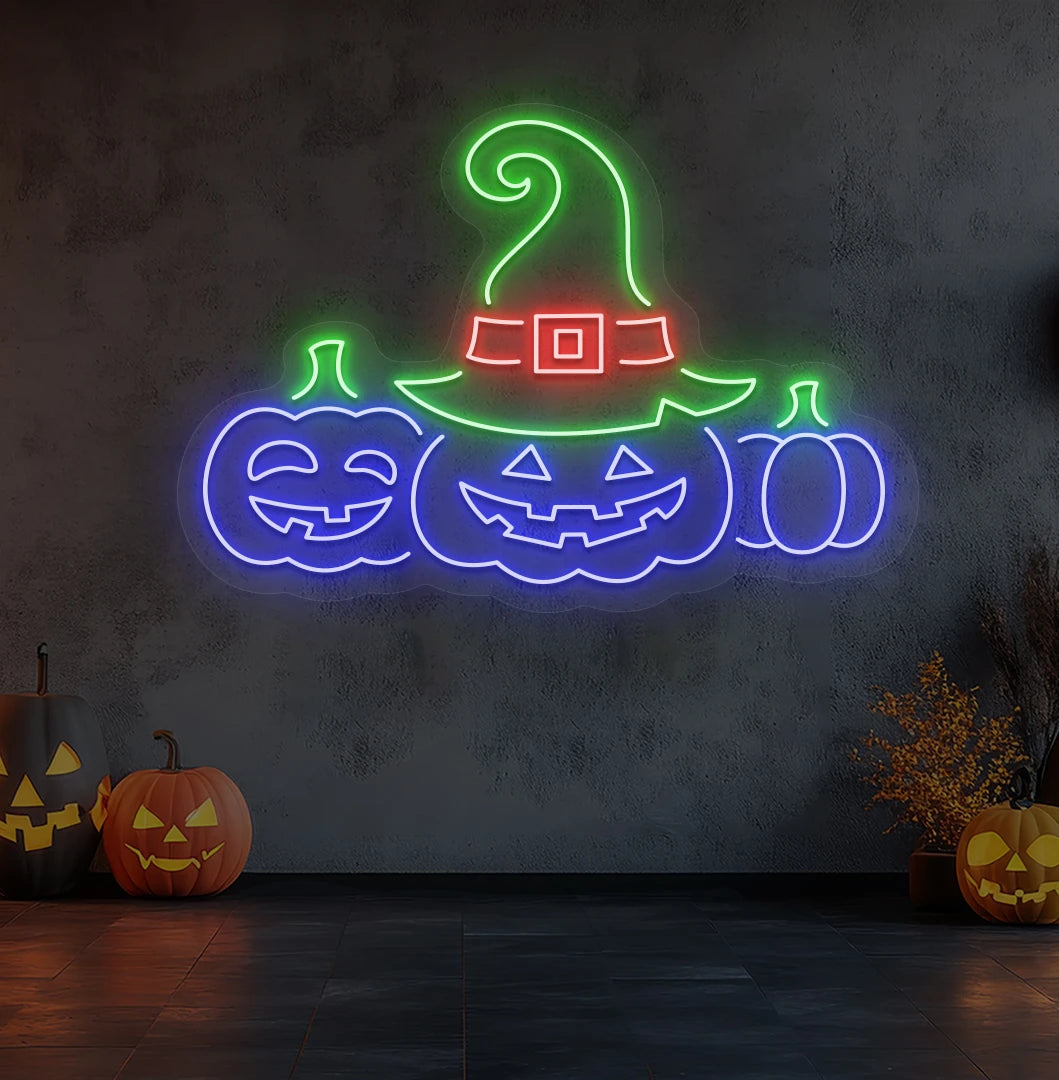 Modern wall decor with pumpkins Halloween neon sign glowing blue.