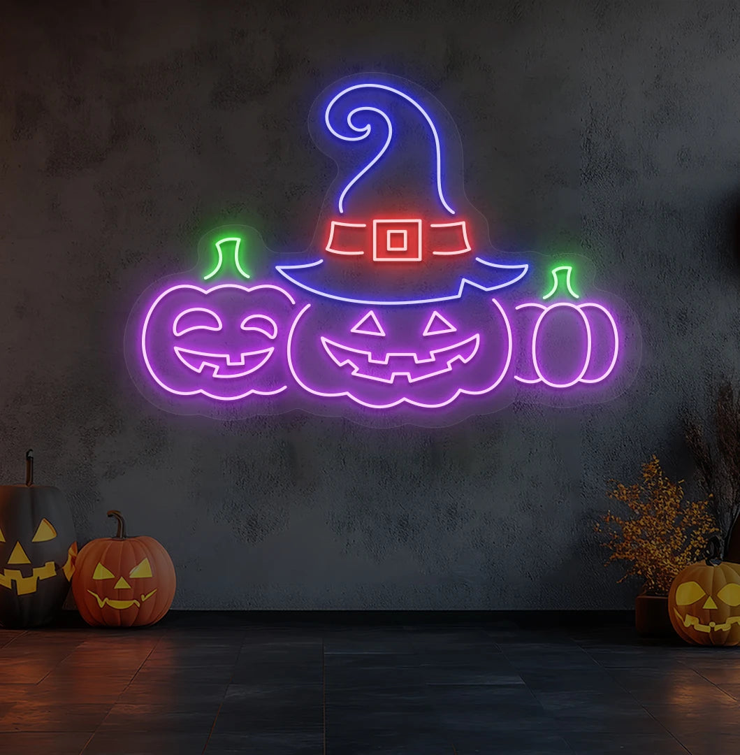 Spooky pumpkins Halloween neon sign in purple mounted on room wall.