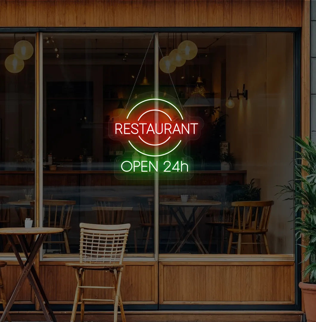 Modern restaurant glass with restaurant open 24-hour neon sign glowing green.