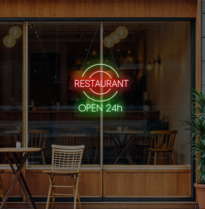 Modern restaurant glass with restaurant open 24-hour neon sign glowing green.
