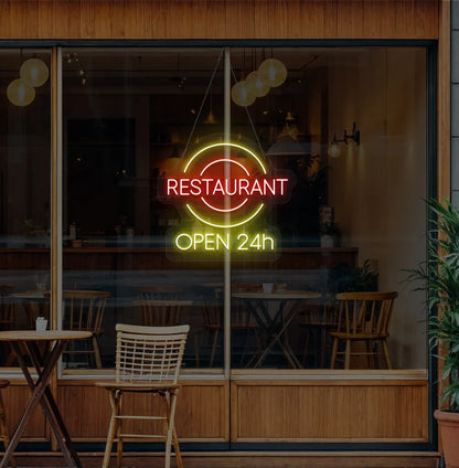 Modern restaurant glass with restaurant open 24-hour neon sign glowing yellow.