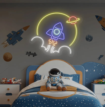 Image of a rocket neon sign in space theme above astronaut toy glowing on kid's room wall in blue color.