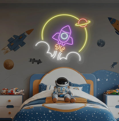 Rocket in space neon sign glowing purple above astronaut toy on kid's bedroom wall.