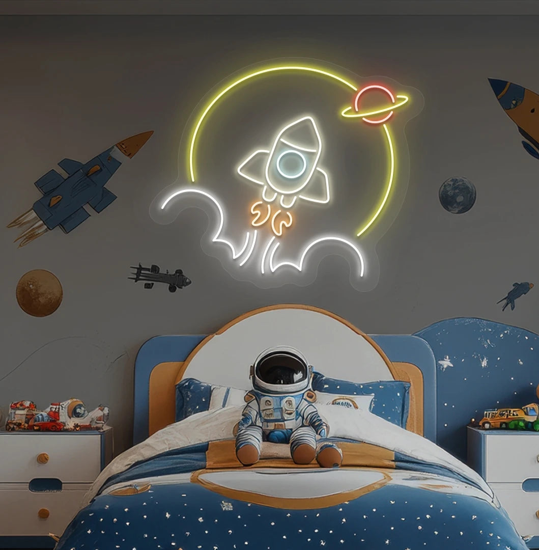 Rocket in space neon sign glowing warm white above astronaut toy on kid's bedroom wall.