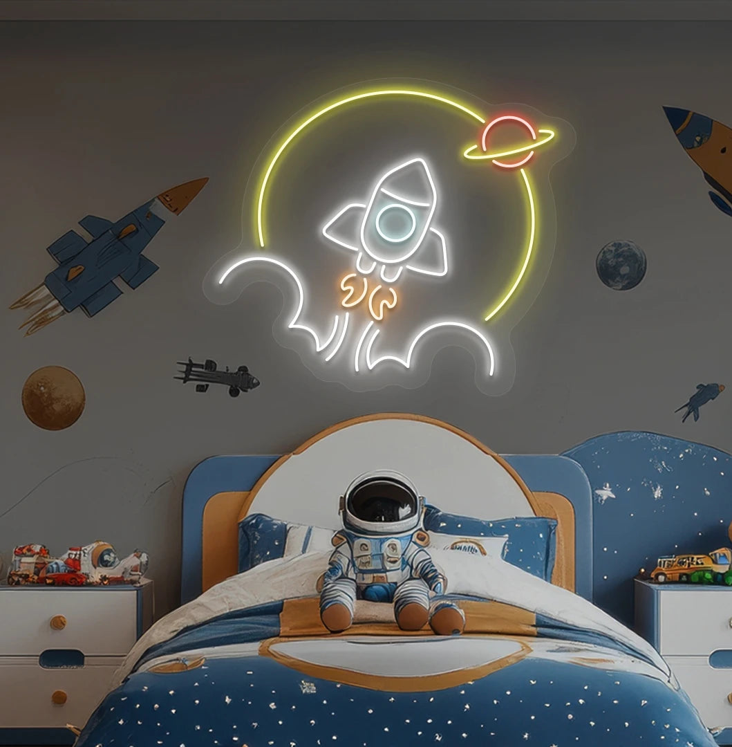 Image of a rocket neon sign in space theme above astronaut toy glowing on kid's room wall in white color.