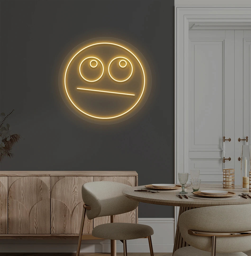 Trendy rolling eyes emoji neon sign in orange mounted on aesthetic wall.