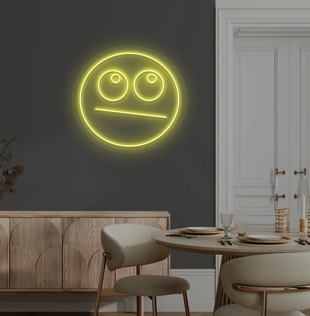 Trendy rolling eyes emoji neon sign in yellow mounted on aesthetic wall.