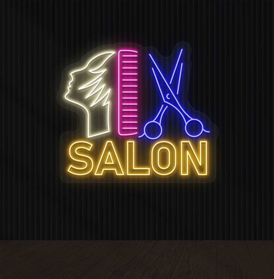 Image of a salon neon sign in multicolor with a comb, scissors, and character design mounted on the salon wall.