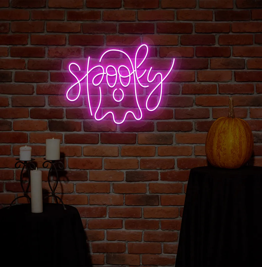 Pink LED Spooky Neon Sign displayed on a Halloween themed background.
