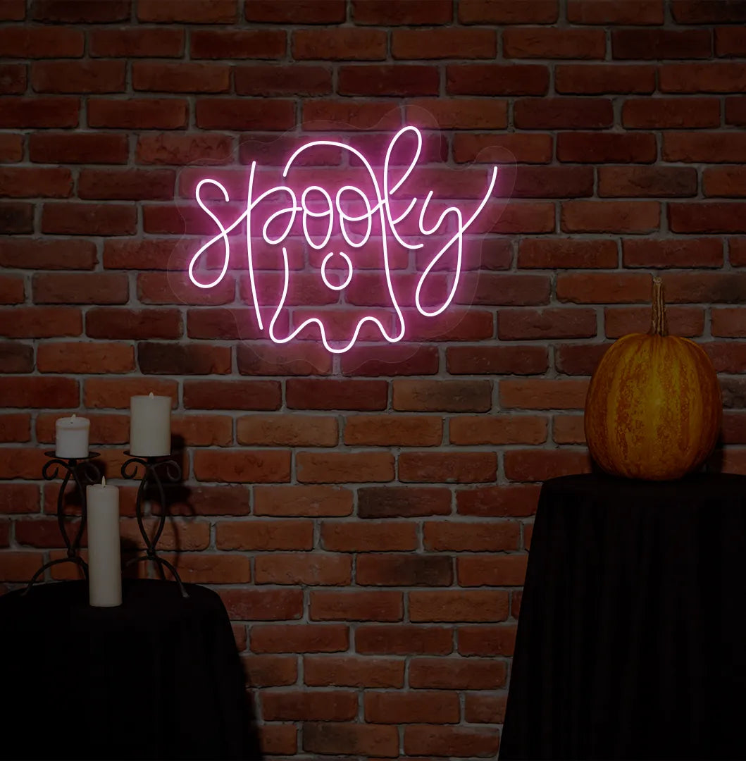Spooky Purple Neon Sign creating an eerie glow on a Halloween themed wall.