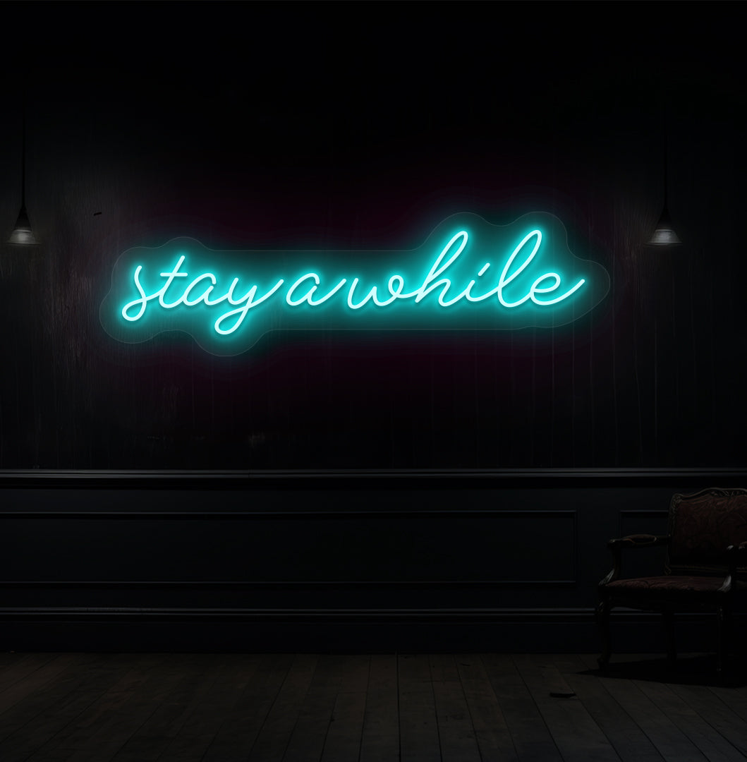 Image of a "stay a while" LED neon sign hanging on a wooden wall in ice blue color. 