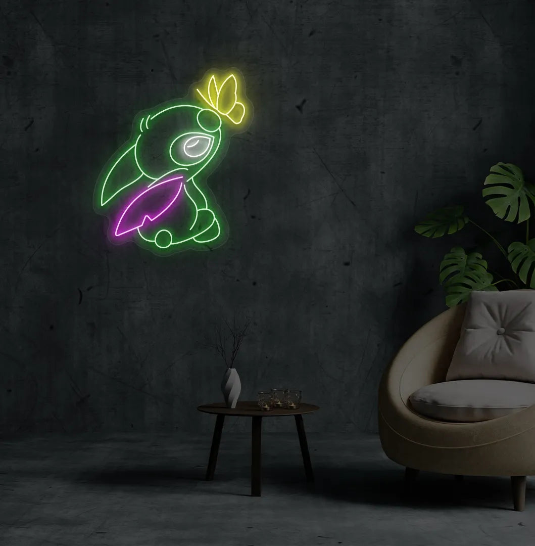 Image of a Cute Stitch neon sign mounted on modern bedroom wall in green color.