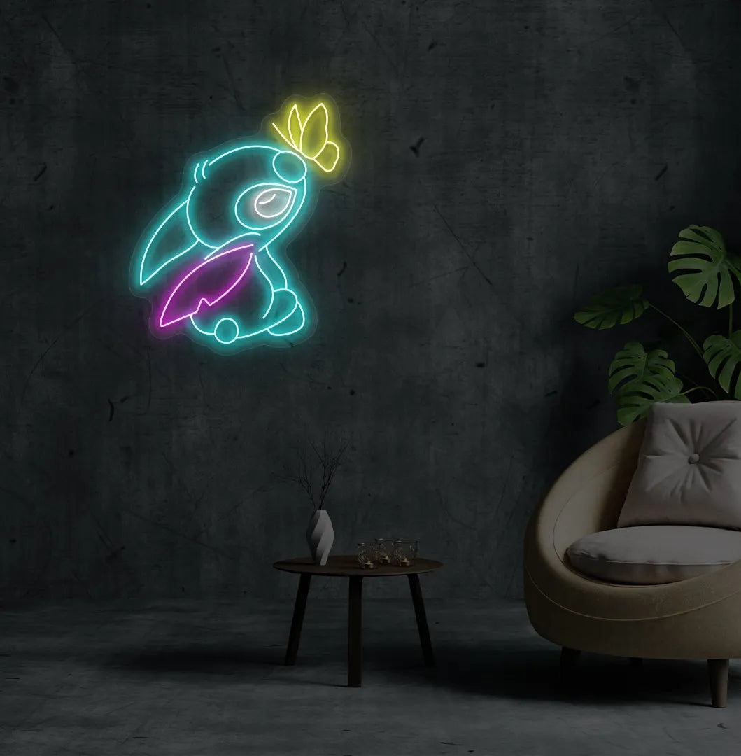 Stitch-inspired iceblue neon sign glowing on decorative wall.