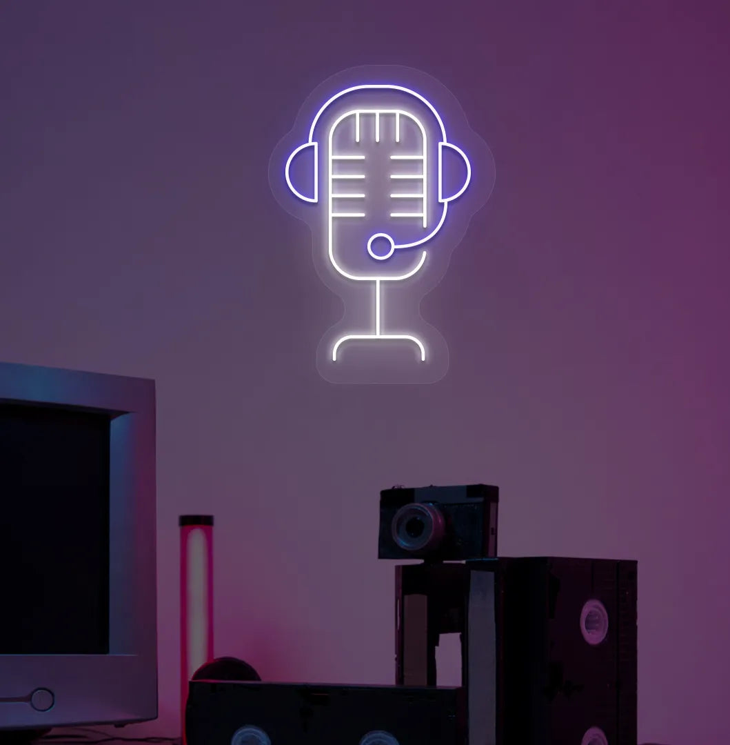 Image of an aesthetic gaming room wall with studio MIC neon sign glowing blue.