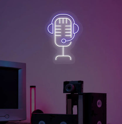 Image of an aesthetic gaming room wall with studio MIC neon sign glowing blue.