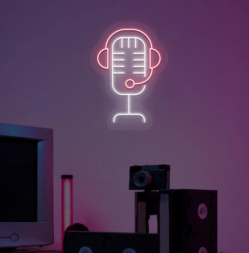 Image of an aesthetic gaming room wall with studio MIC neon sign glowing red.