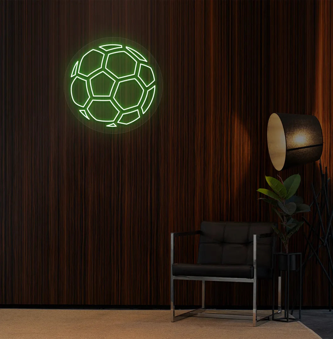 Modern sports wall decor with stylish football neon sign glowing green.