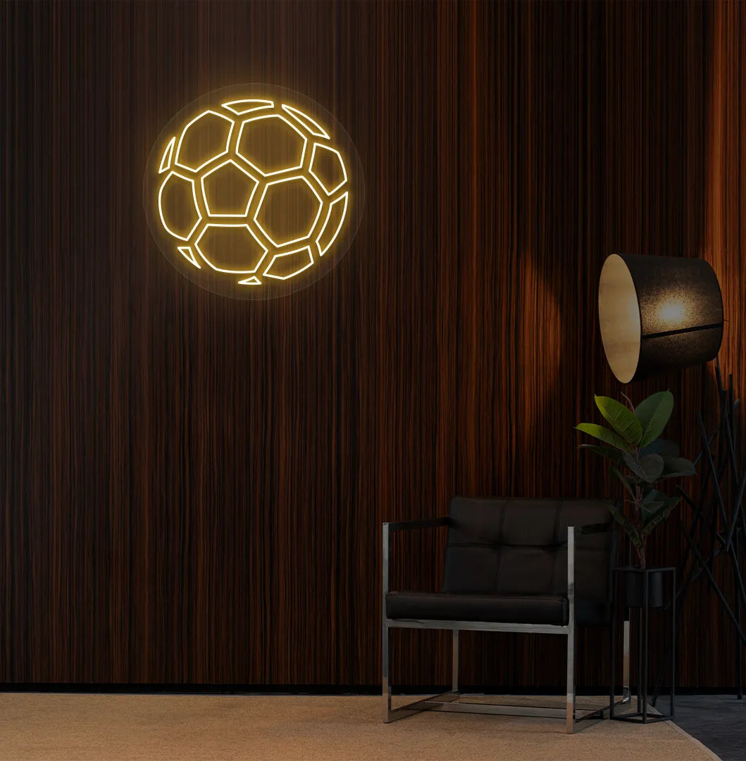 Modern sports wall decor with stylish football neon sign glowing orange.