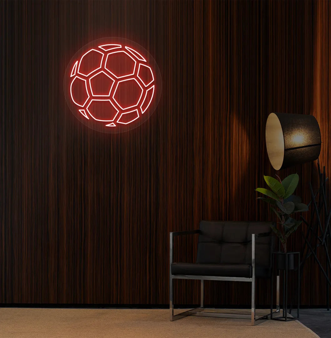Red stylish football LED neon sign mounted on aesthetic room wall.