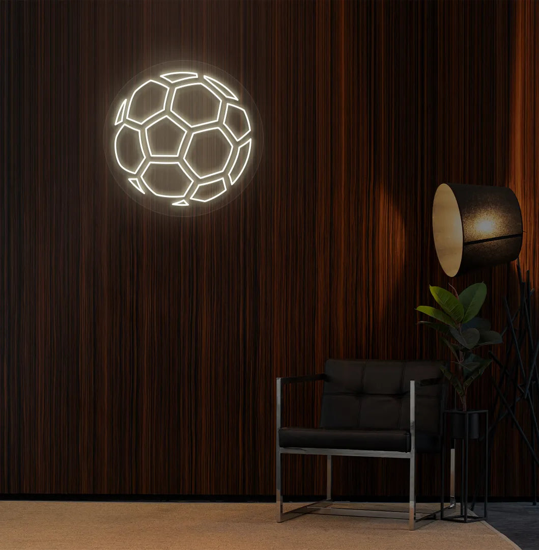 Modern sports wall decor with stylish football neon sign glowing warm white.