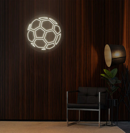 Modern sports wall decor with stylish football neon sign glowing warm white.