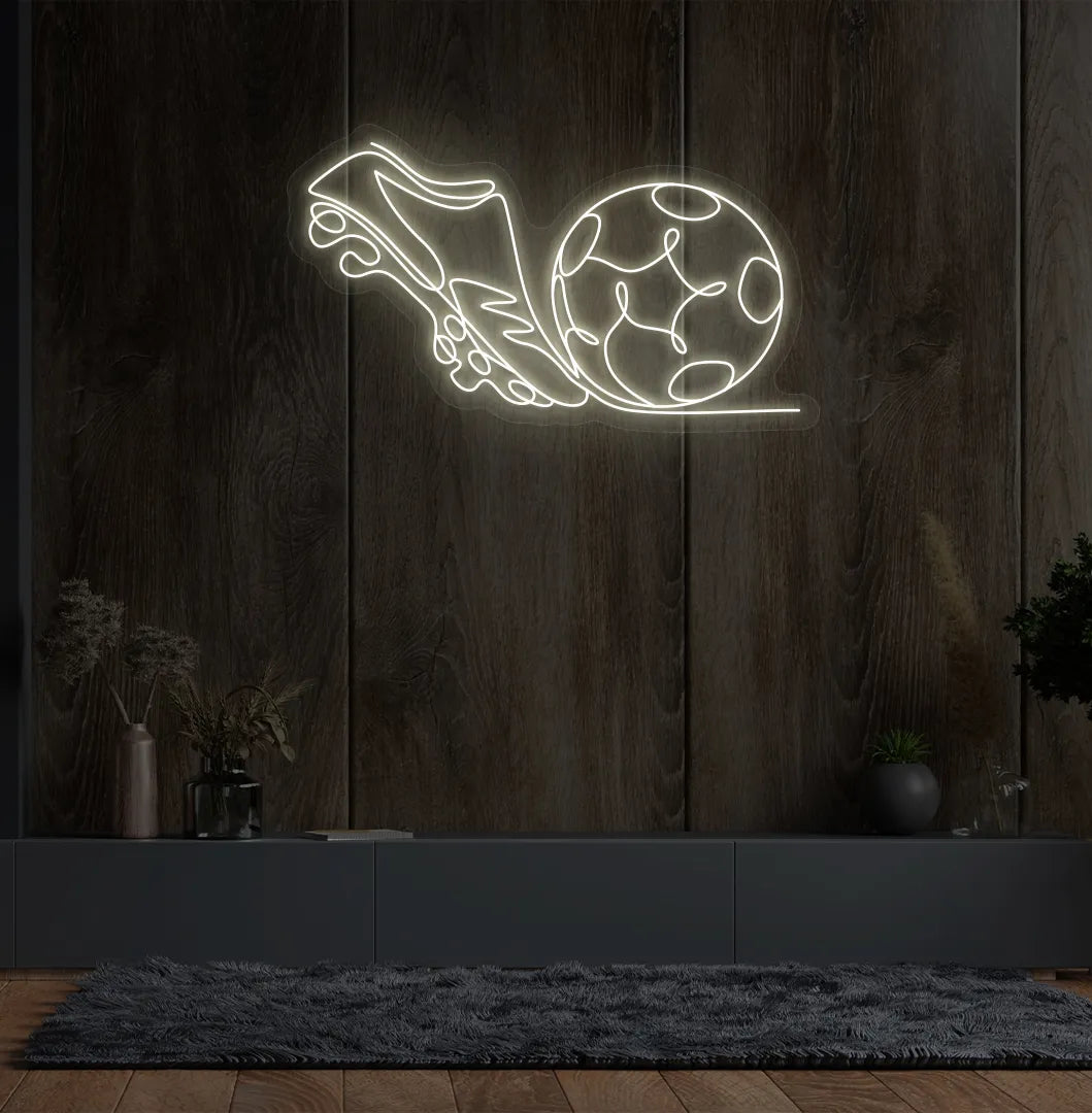 Stylish football with shoe neon sign mounted on aesthetic wall in warm white color.